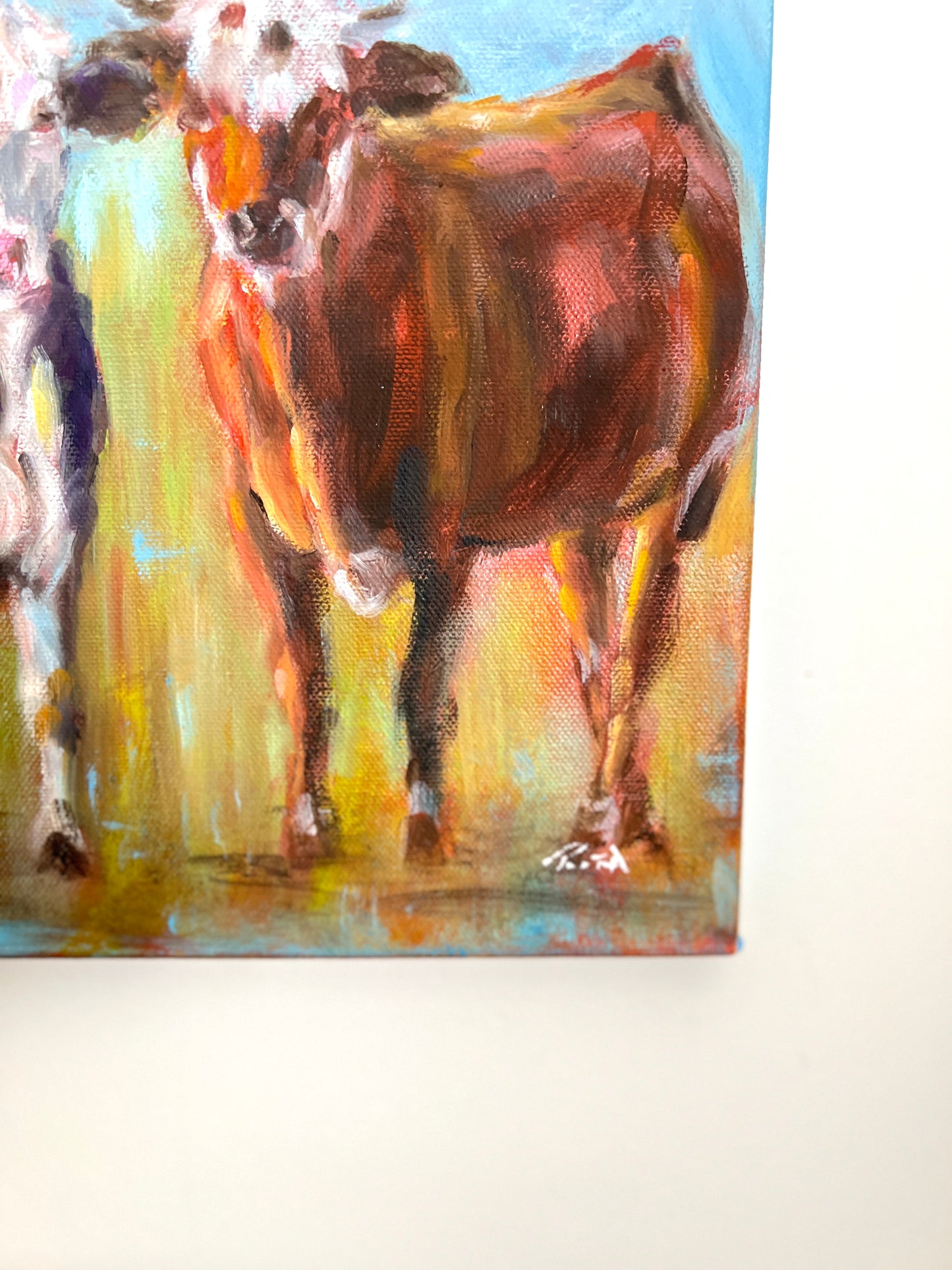 Three Cows Under Open Skies